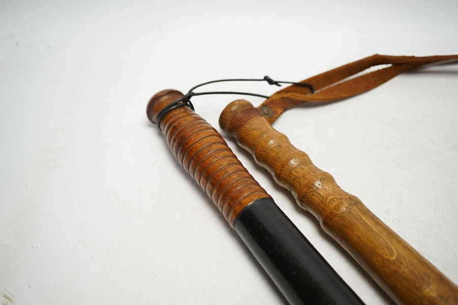 Two early 20th century truncheons, one painted with the Saint Georges Cross, 46cm. Condition - fair to good